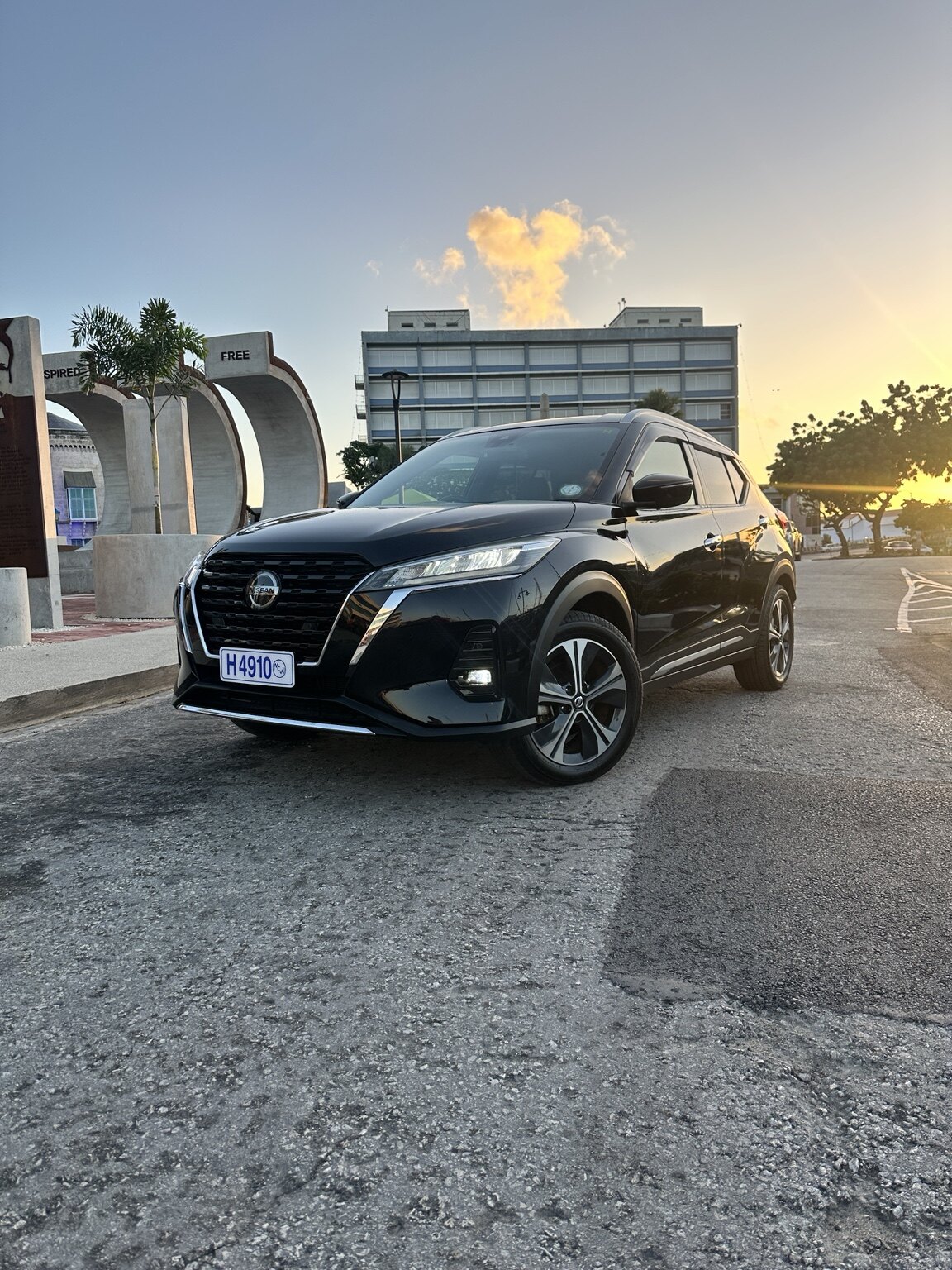 Actual black Nissan Kicks from the 360 Car Rentals fleet at sunset